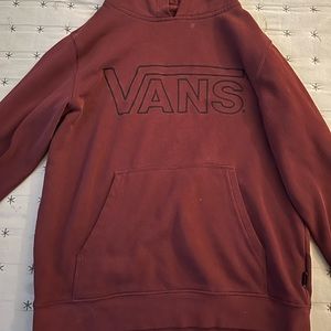 hello welcome to my page this is a vans sweater that is the color burgundy.